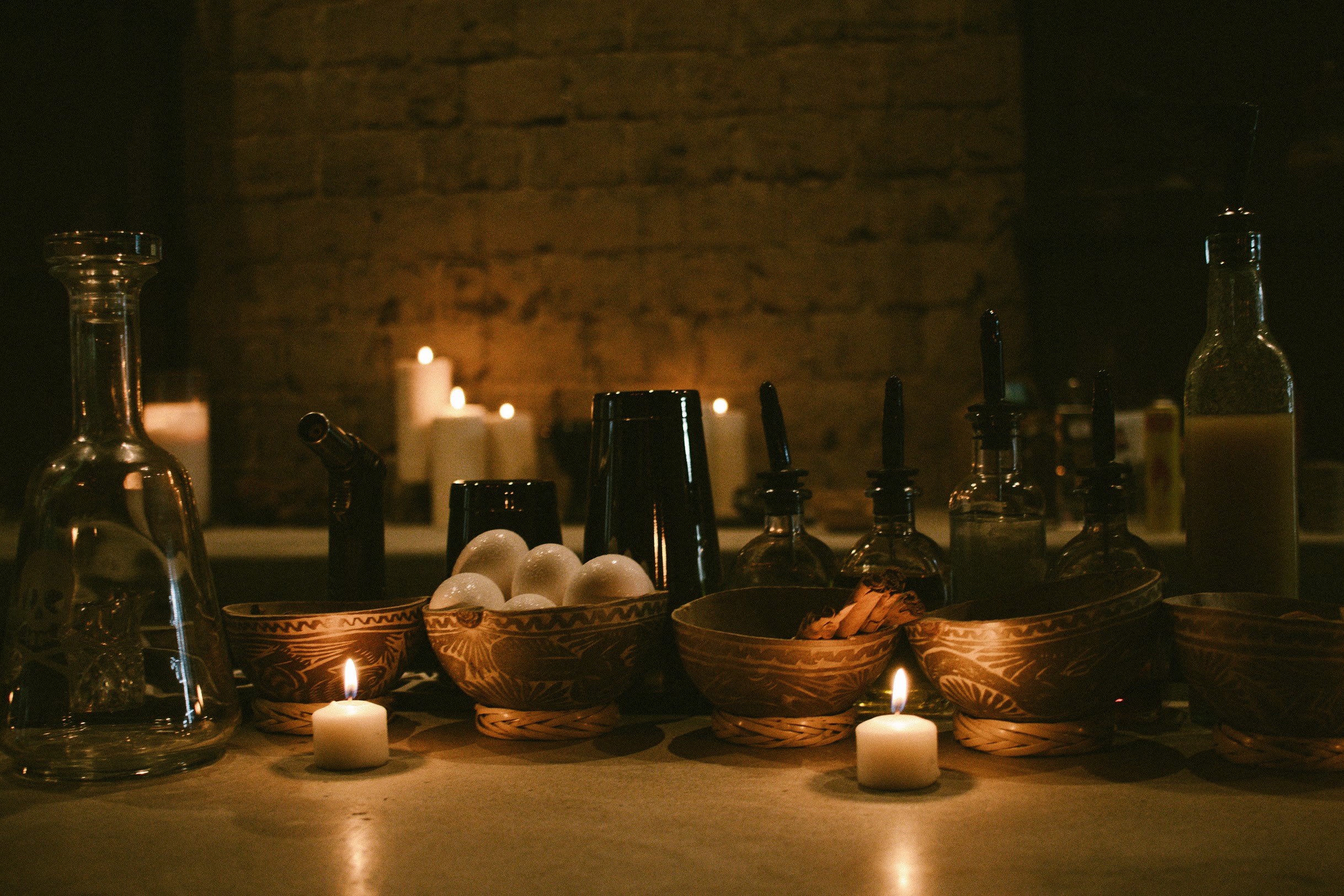 Candles on a bar at Ayahuasca Cantina.