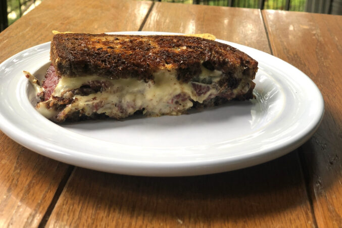 A half pastrami sandwich on marbled rye bread from Brown Bag Provisions.