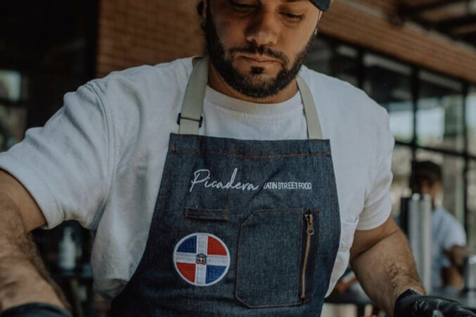 Image of Michael Tavarez who owns and runs his Dominican street food pop-up called Picadera.