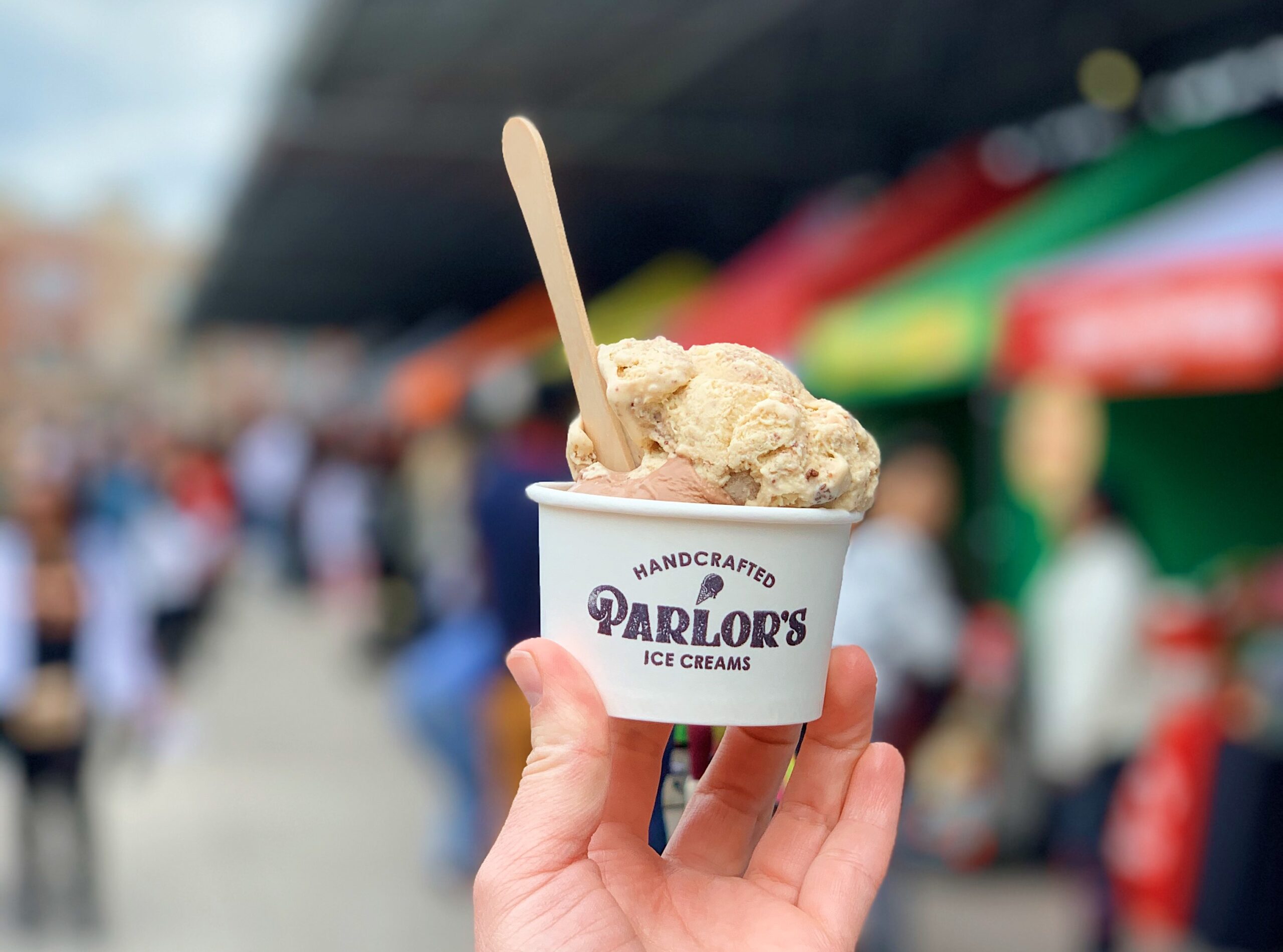A scoop of Parlor's Handcrafted Ice Cream in a cup.