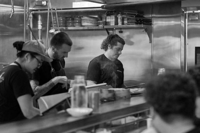 chef Justin Holt and his crew in the Salaryman kitchen.