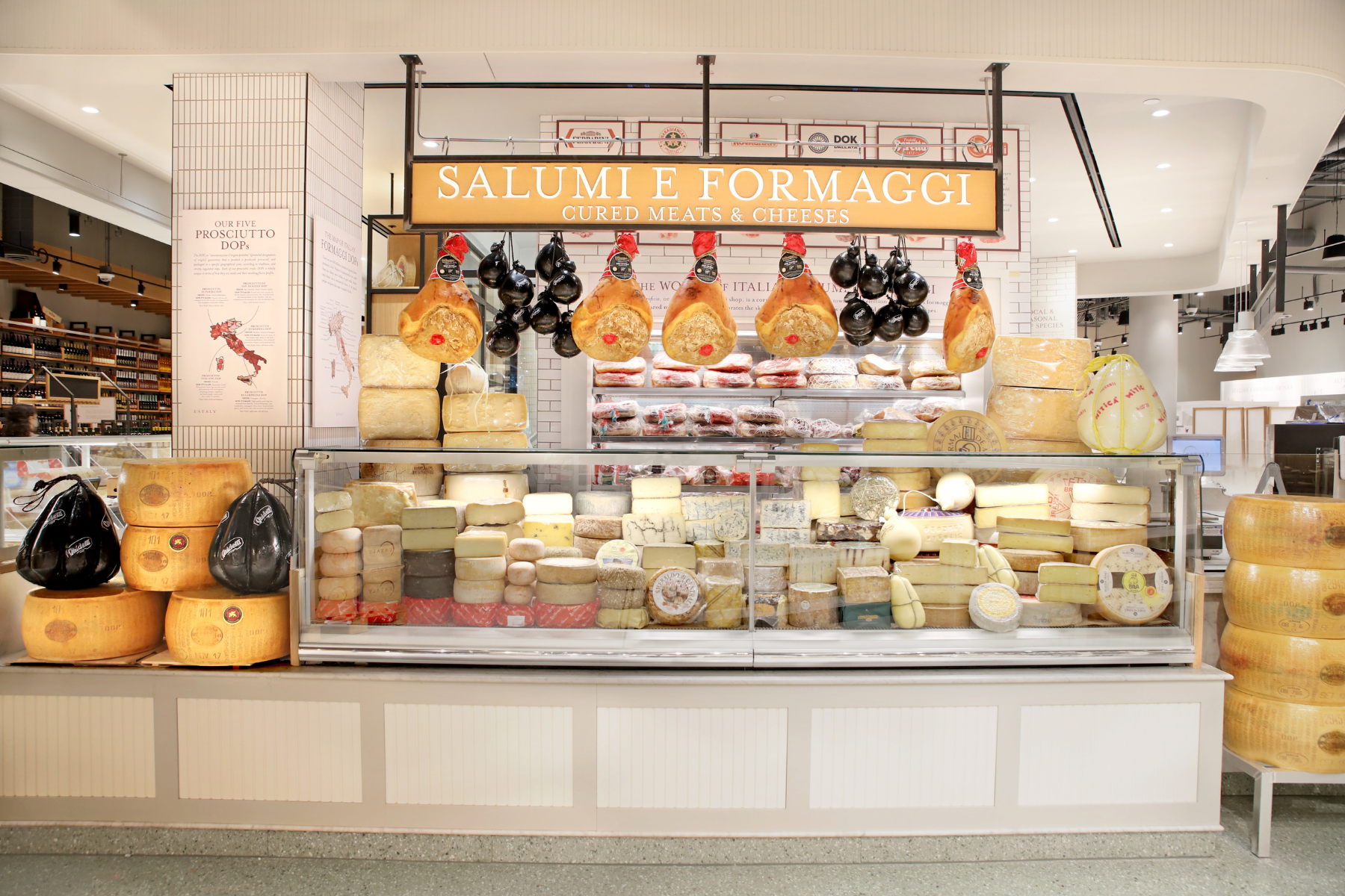 The cured meat and cheese counter inside Eataly Dallas.