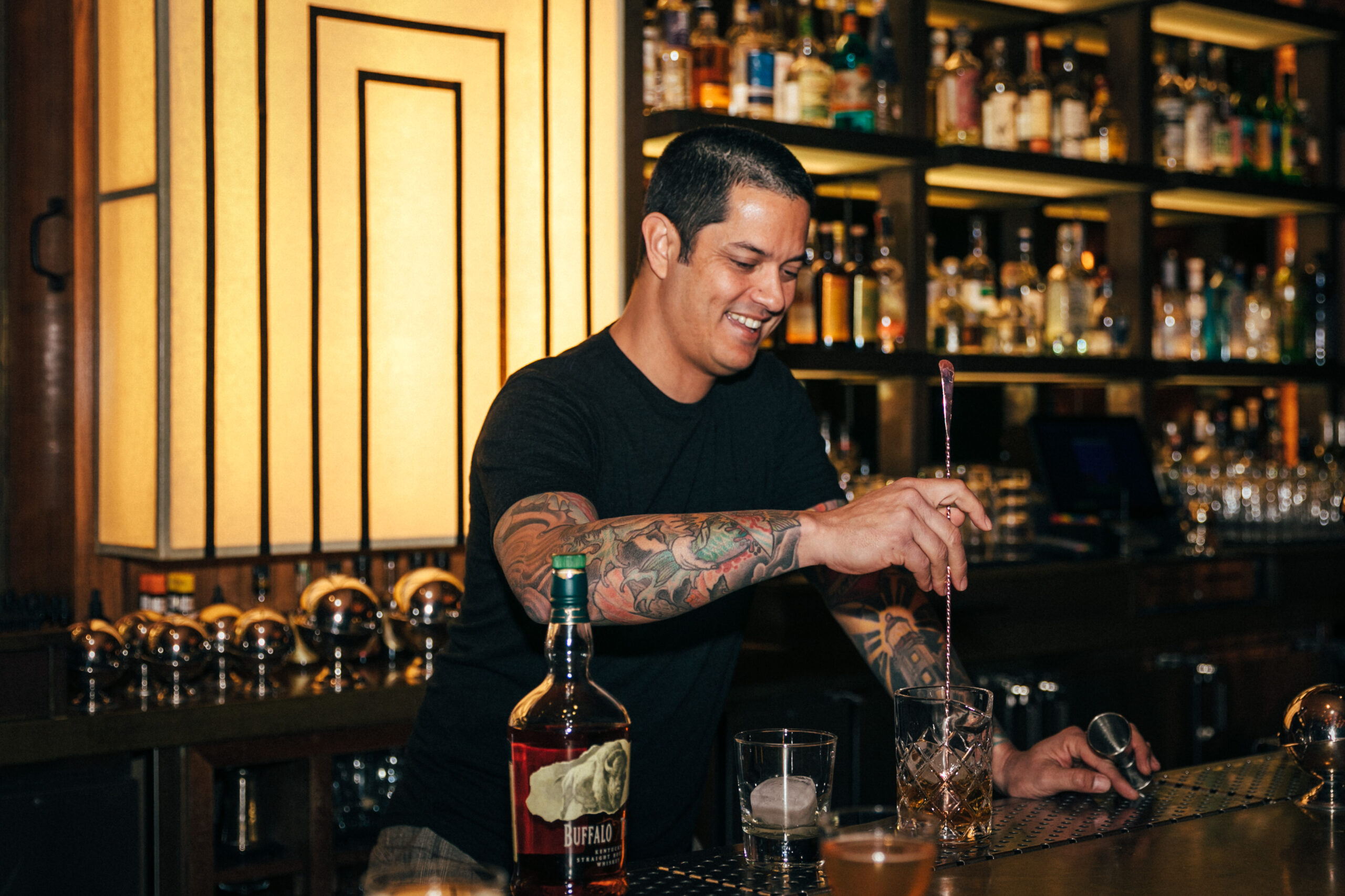 New Midnight Rambler general manager, Gabe Sanchez, looks happy to be behind the bar again.