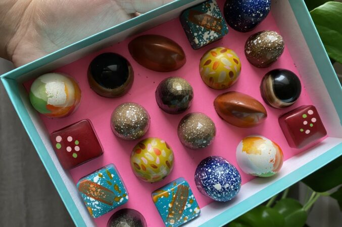 A box of colorful chocolate bonbons by Maravilla Cacao.