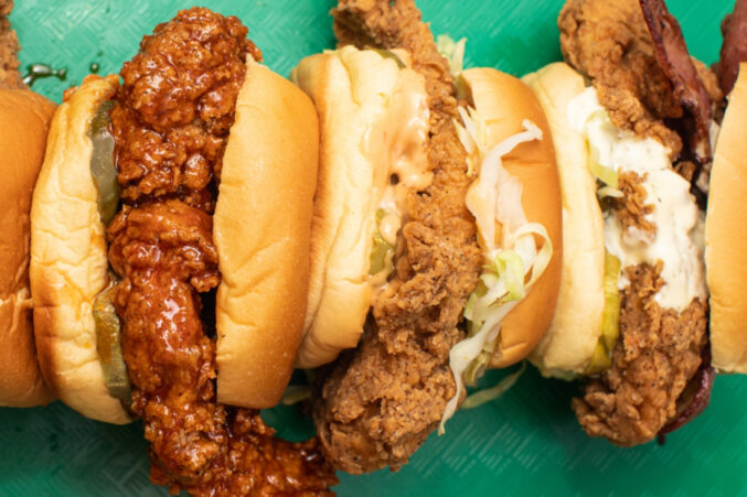 A lineup of Fuku fried chicken sandwiches.
