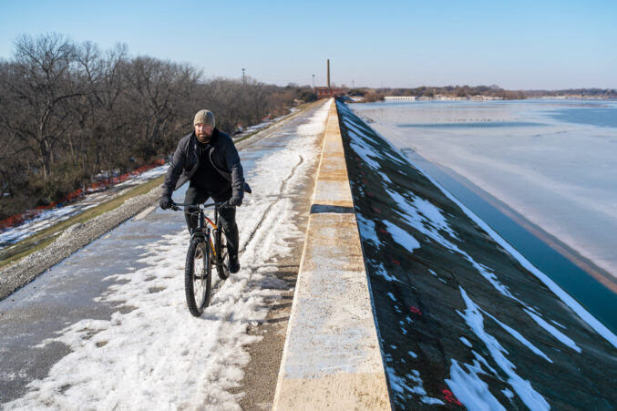 Harry Jones biking along White Rock Lake