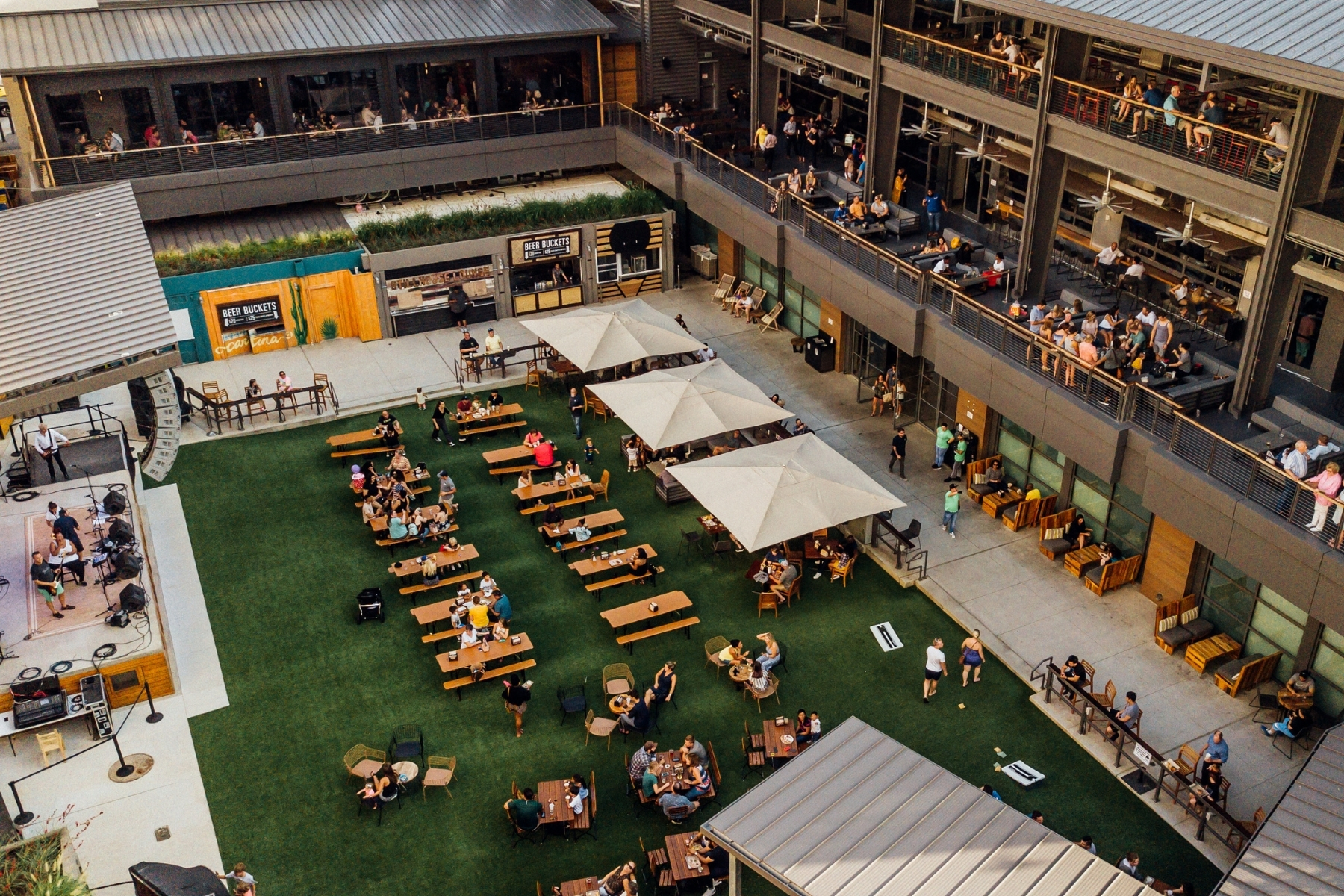 An outdoor space with a stage at Plano's Legacy Hall