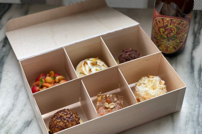 A box of six desserts.