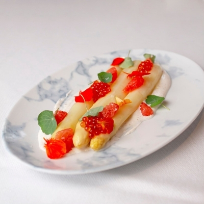 White asparagus with trout roe and nasturtium leaves.