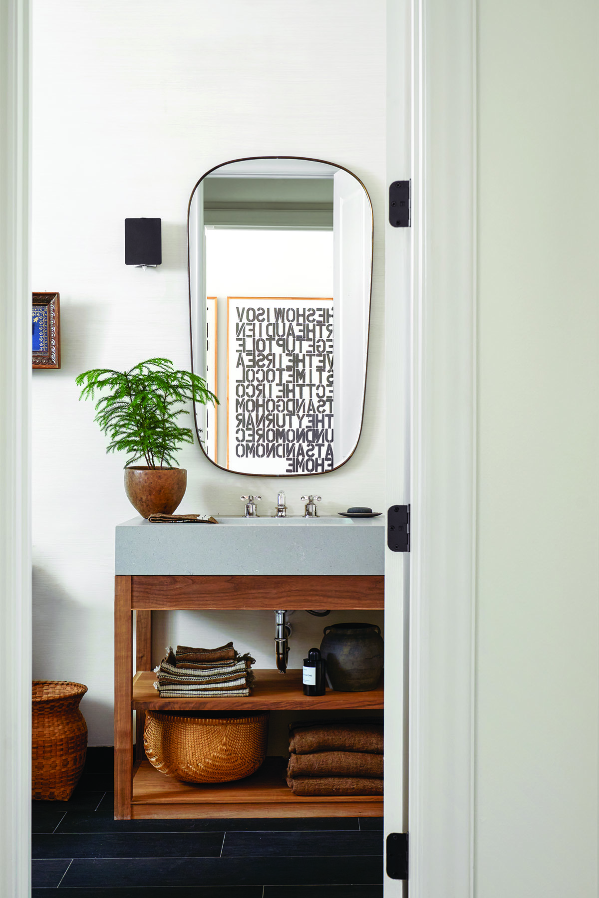 Powder room with mirror and vintage sink.