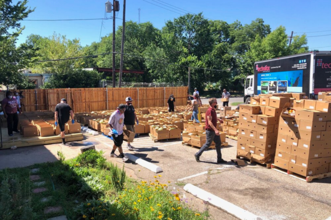The 4DWN parking lot becomes a temporary food distribution center on Wednesdays, when volunteers, artists, community members, skaters help organize produce boxes for those living with food insecurity in Dallas.