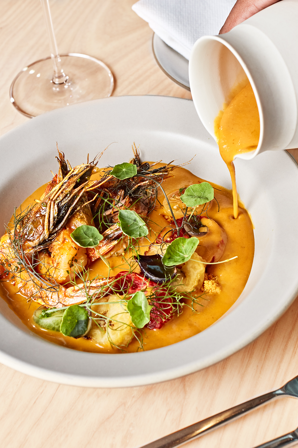 https://assets.dmagstatic.com/wp-content/uploads/2021/12/Meridian-Grilled-Blue-Prawns-Stew.jpg