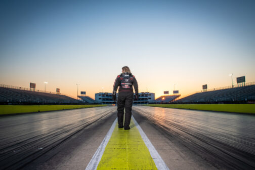 Nancy standing in Texas Motorplex