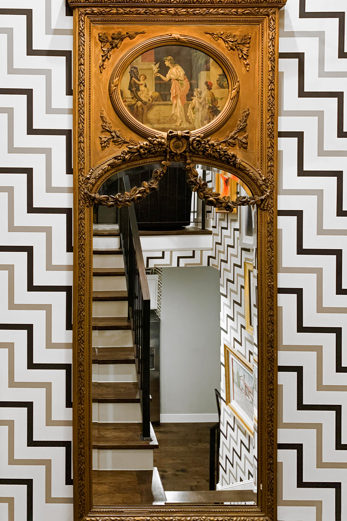 Ellet Miciotto of EJM Interior Design's 19th-century floor-length beveled glass trumeau