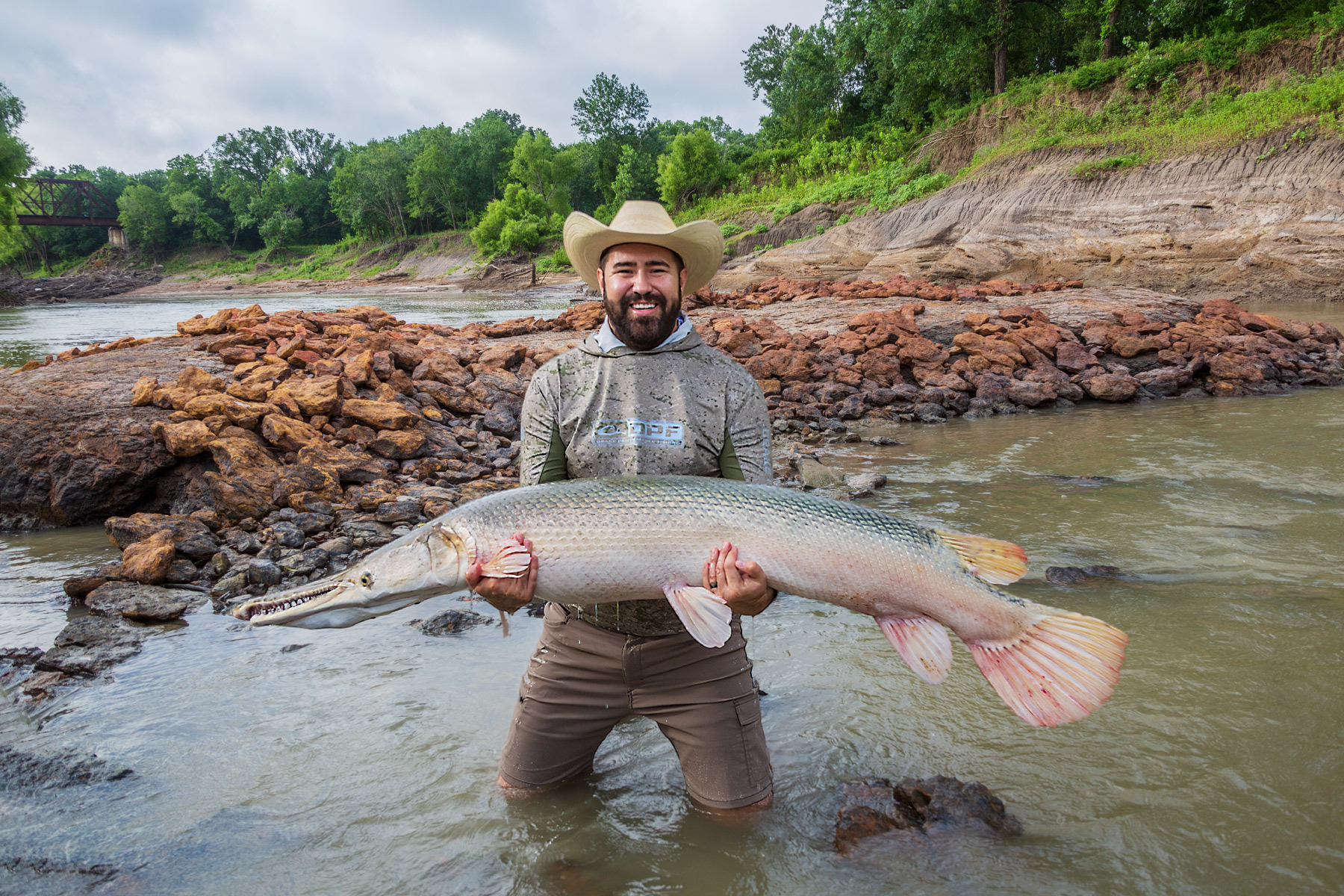 https://assets.dmagstatic.com/wp-content/uploads/2023/09/John-Gay-with-a-gar-he-pulled-from-the-Trinity-River.jpg