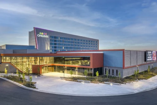 Oaklawn Casino exterior building at dusk.